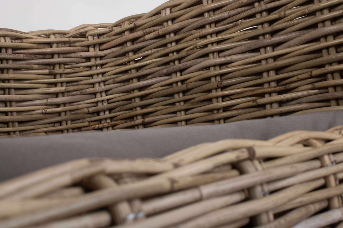 Close-up of the hand-woven grey rattan on a dog sofa bed